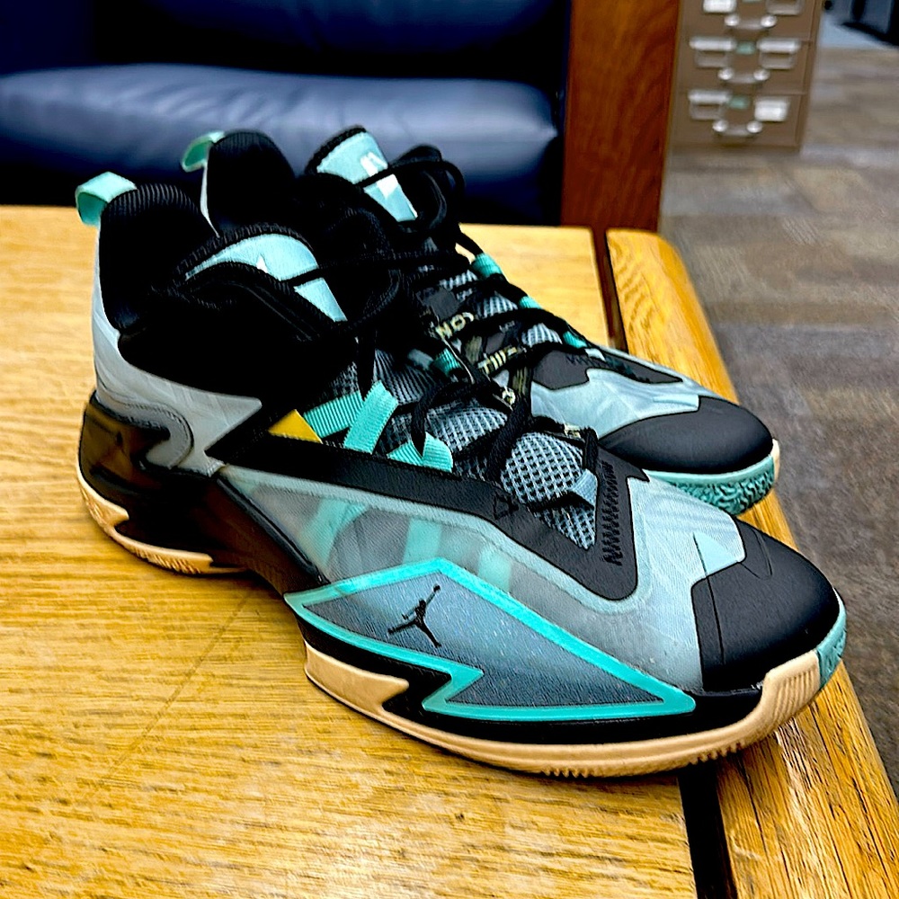 Jordans. Black and teal.  Great shape. Cared for every wear.
